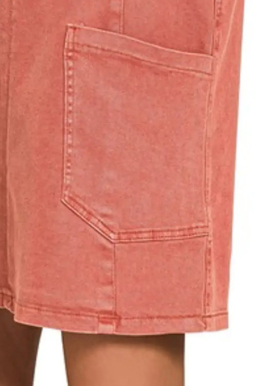 Coral-colored denim shorts with pockets and relaxed fit from Zenana Washed Adjustable Strap collection