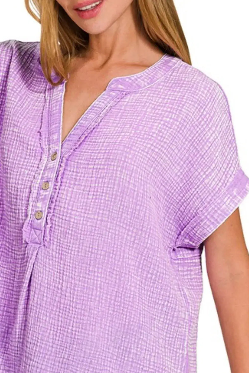 Lavender washed double gauze henley neck blouse with textured pattern and short sleeves