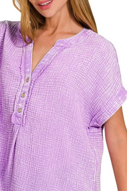 Lavender washed double gauze henley neck blouse with textured pattern and short sleeves