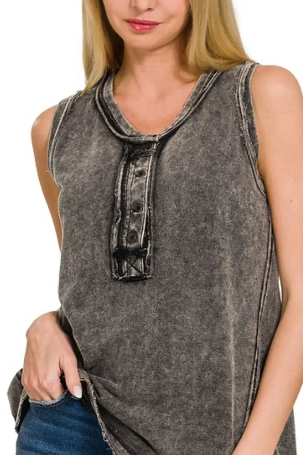 Black distressed sleeveless Henley top with raw edge and button detail in soft cotton blend