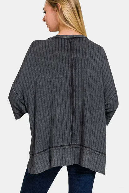 Charcoal gray washed ribbed drop shoulder oversized sweater with black trim and round neckline