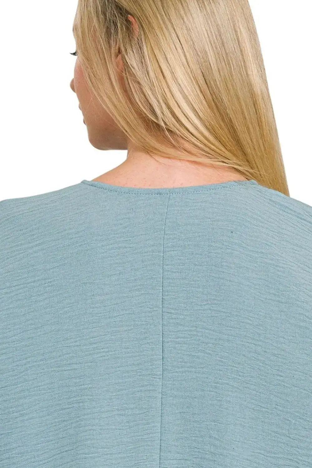 Light blue textured Zenana woven airflow puff half sleeve top with round neckline
